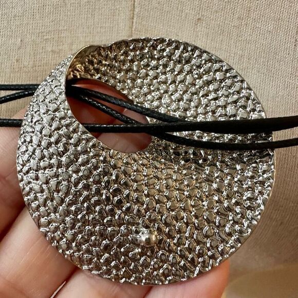 Round silver tone pendant necklace on long black cord - Picture 10 of 10